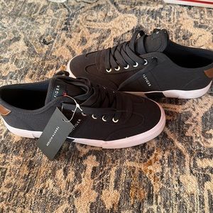 Men or boys Tommy Hilfiger lace up shoes.